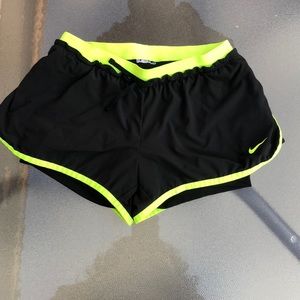 black and neon green nike shorts